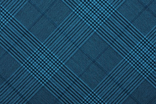 Blue material in geometric patterns, a background or texture