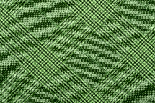 Green material in geometric patterns, a background or texture