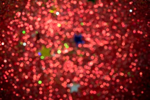 Red and green holiday bokeh. Abstract Christmas background