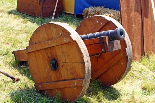 Old cannon made of wood and iron