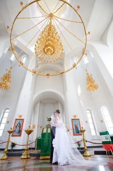 bride and groom in the church