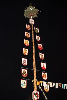 NEUHAUSEN, GERMANY ��� MARCH 4, 2014: A tree symbolizing the various groups participating at the carnival festivities in Neuhausen on March 4, 2014 in Neuhausen (near Stuttgart), Germany. Carnival has a very long tradition in Neuhausen with influences of the swabian alemanisch culture that can be seen by the wooden masks people are wearing as part of their costumes.