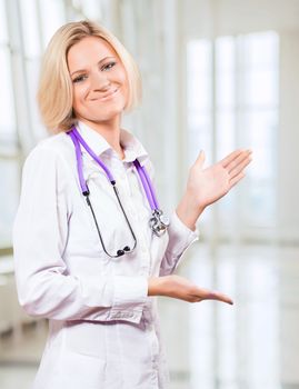 female doctor showing empty hands