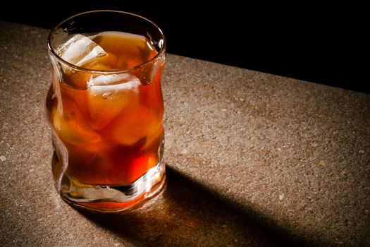 glasses from whiskey on a wooden table