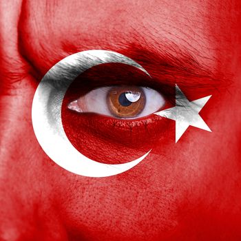 Turkey flag painted on angry man face