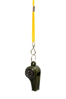 green whistle with a compass on a yellow cord