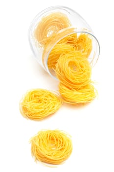 pasta in glass jar on a white background