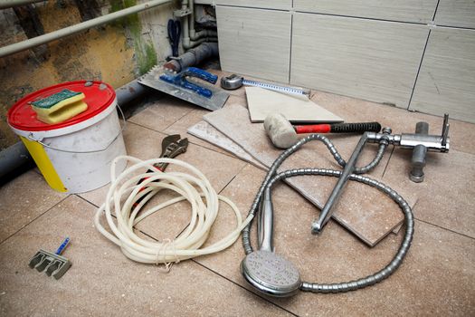 different tools for repair in the bathroom