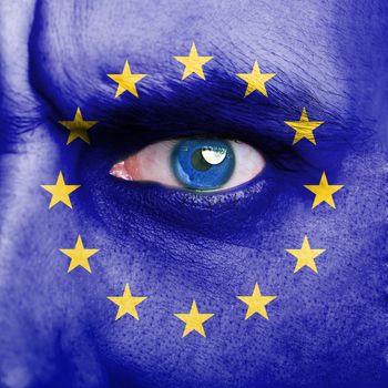 European Union flag painted on man face