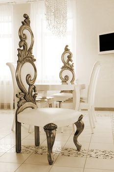 beautiful white chairs in a modern apartment