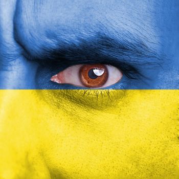 ukraine flag painted on face
