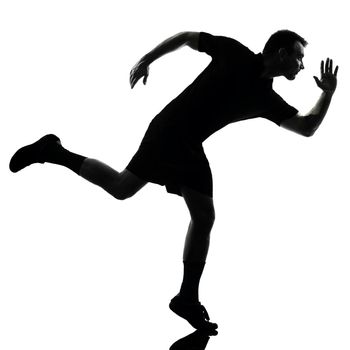 one man runner running in studio silhouette isolated on white background