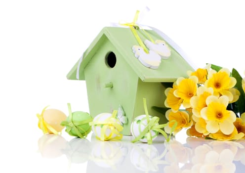 eggs with birdhouse, on a white background
