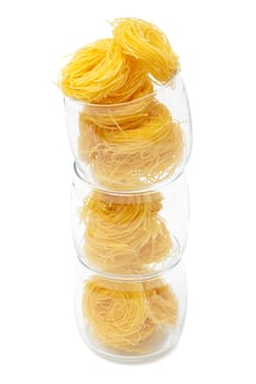 pasta in glass jar on a white background