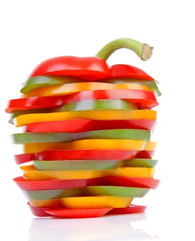 One Paprika made out of colorful slices over white background