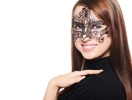Beautiful woman in carnival mask over white background