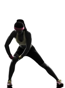 one woman exercising fitness workout in silhouette on white background