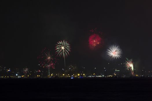 Fireworks over Patong City, South of Thailand on the feast of "New Year", View from the Sea