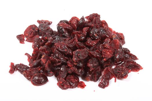 Healthy dried cranberries on a white background