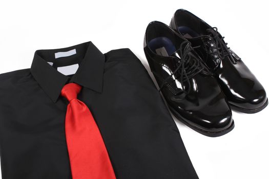 Mens shiny lace up formal black shoes with dress up shirt and red tie