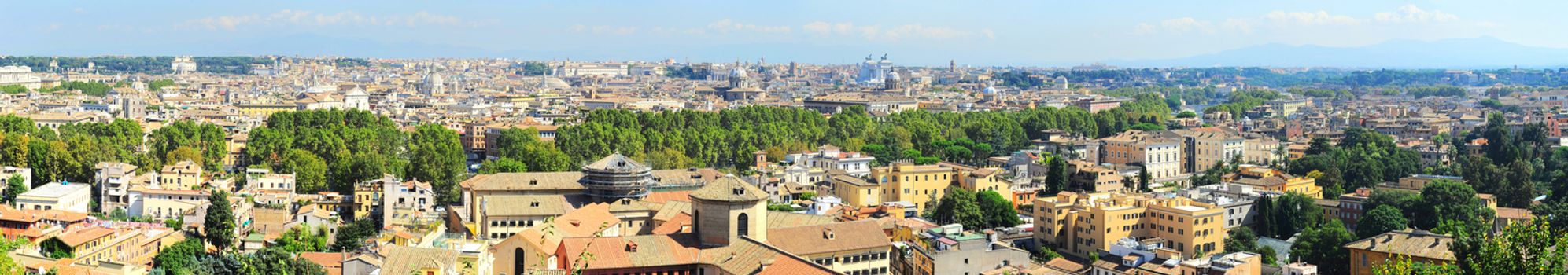 Wide panoramic view of Rome in the day. Italy