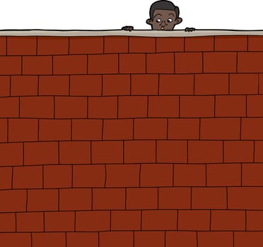 Cute Hispanic boy looking over brick wall