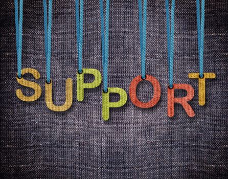 Support Letters hanging strings with blue sackcloth background.