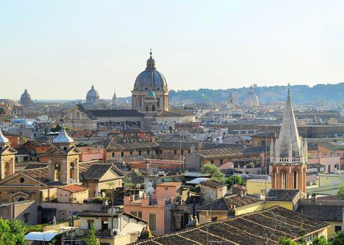 Aerial colorful view of Rome at sunset. Italy