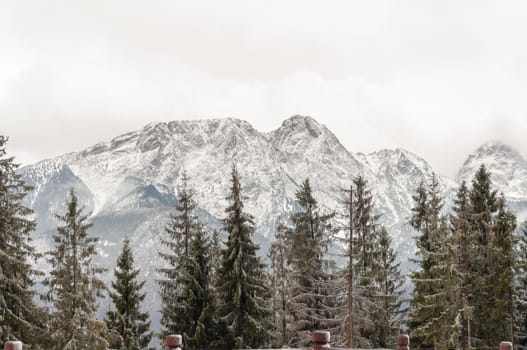 Tatra Mountains with Giewont peak in winter on cloudy day