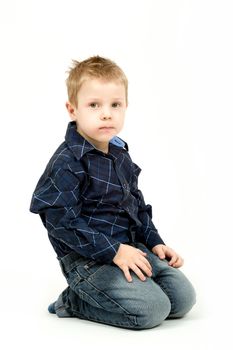 Studio portrait of young beautiful boy on white background