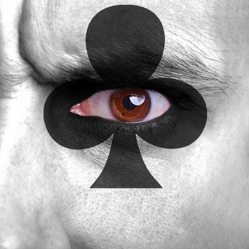 Cards symbol painted on human face - symbol of hazard
