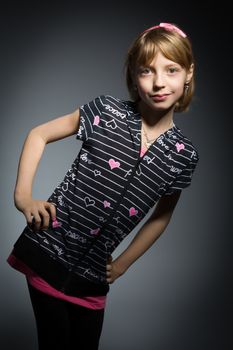 Studio portrait of young beautiful girl with nice eyes on black