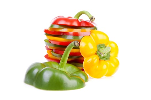 Paprika made out of colorful slices over white background