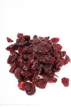 Healthy dried cranberries on a white background