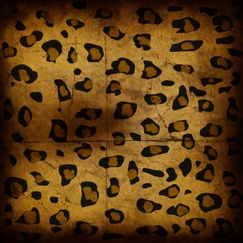 the texture, vintage background of the cheetah skin design on grunge paper
