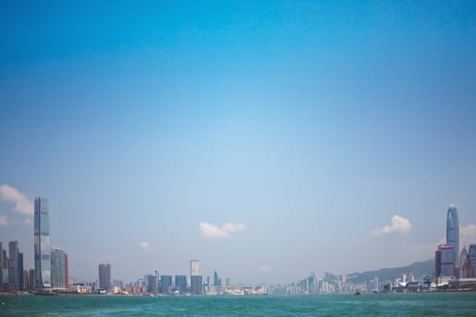 Hong Kong victoria harbour, wide shot, daytime