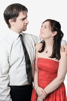 Cute young couple happy together on a white background