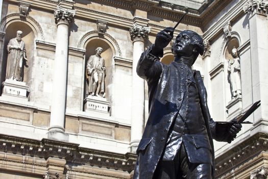 Statue of English painter Joshua Reynolds situated at Burlington House which houses the Royal Academy of Art in London.