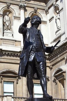 Statue of English painter Joshua Reynolds situated at Burlington House which houses the Royal Academy of Art in London.