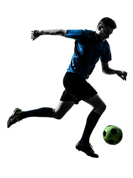 one caucasian soccer player man juggling ball in silhouette isolated white background