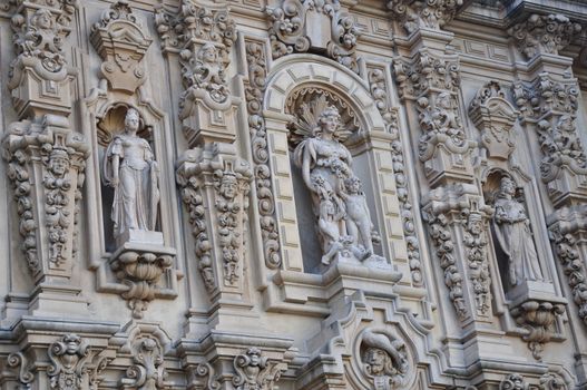 View of detailed carvings and sculptures which are found on many historic buildings in Balboa Park in the city of San Diego, California.