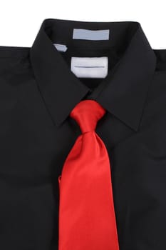 Black dressy business shirt and formal red tie on a white background