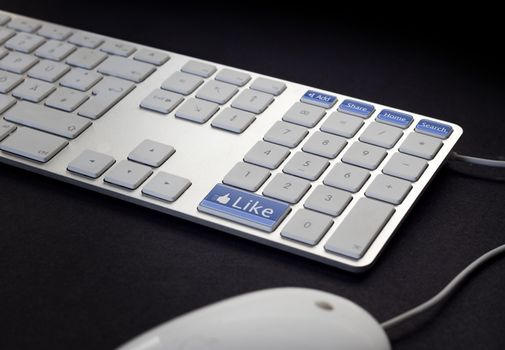 Computer Keyboard with social and media like - button 