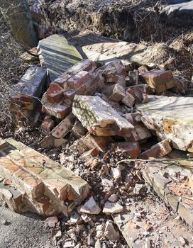 rubble remains of broken wall