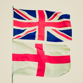 Vintage retro looking Flags of UK and Englan - isolated over white background