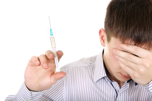 Sad Teenager with Syringe Isolated on the White Background