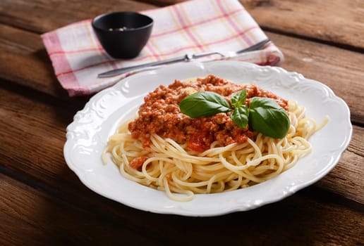 Tasty spaghetti with cheese and basil