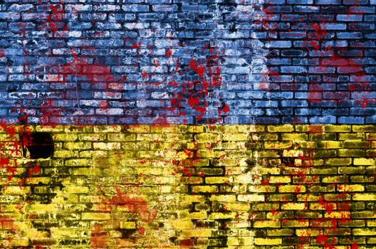 Ukraine flag painted on dark wall with blood