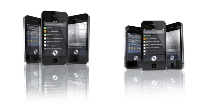 Aachen, Germany - November 14, 2011: Studio shot of 3 Apple iPhone 4S 's showing the Siri Speech App 