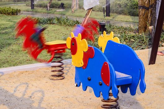 Empty children playground at the park : spring toy